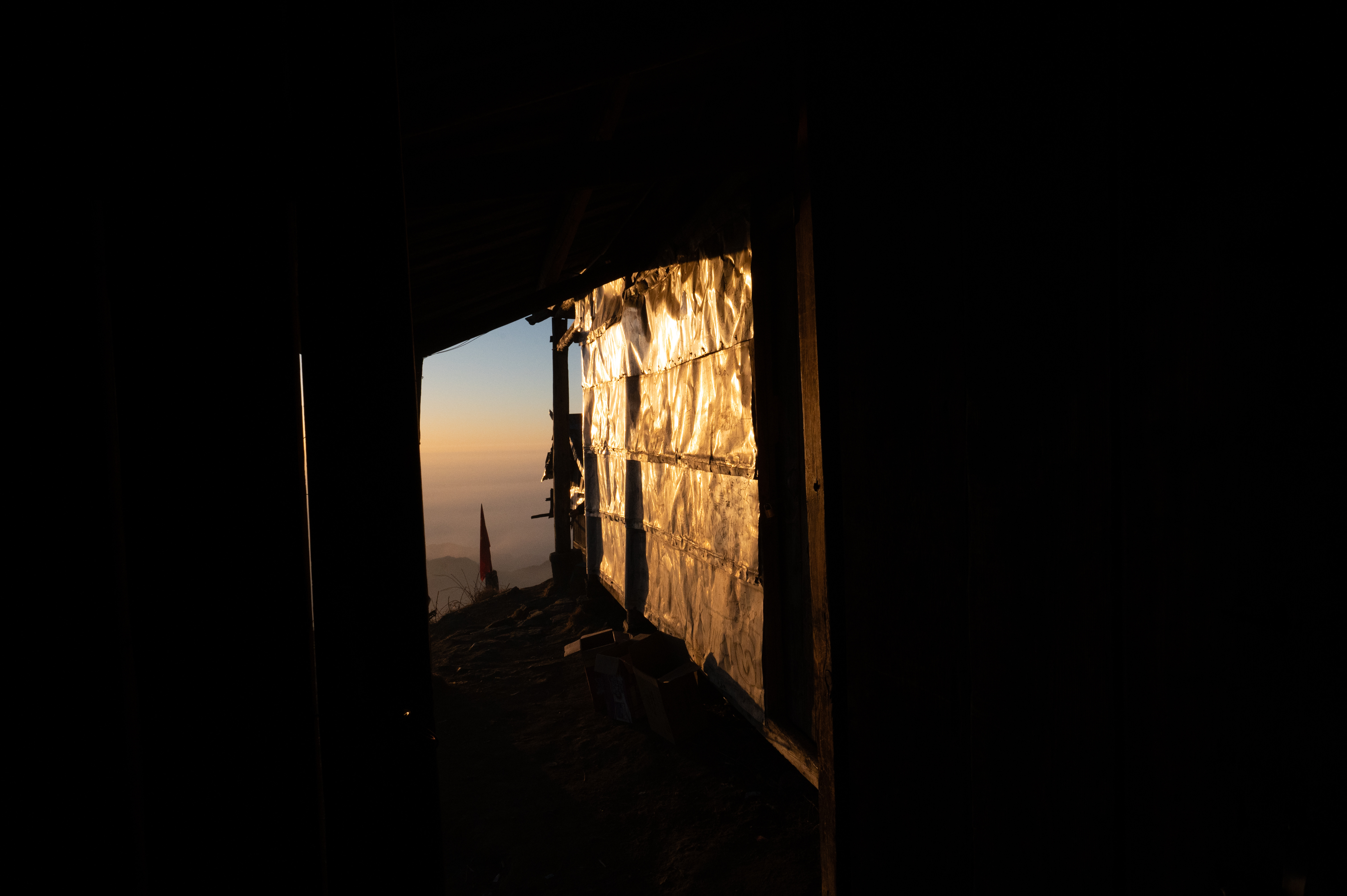 A small cabin at the peak